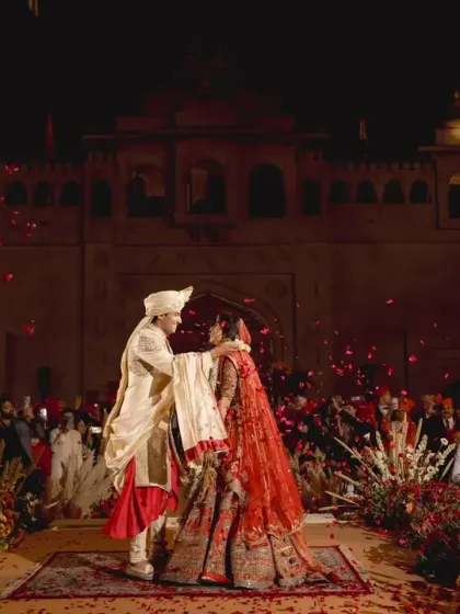 A moment of pure celebration as the couple exchanges garlands under a shower of petals and soft fireworks. We choreograph these varmala moments to be the spectacular highlight of the ceremony.