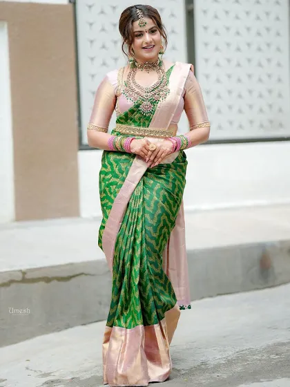 Another full-length shot, showcasing the beautiful drape of the saree and the complete jewellery set.