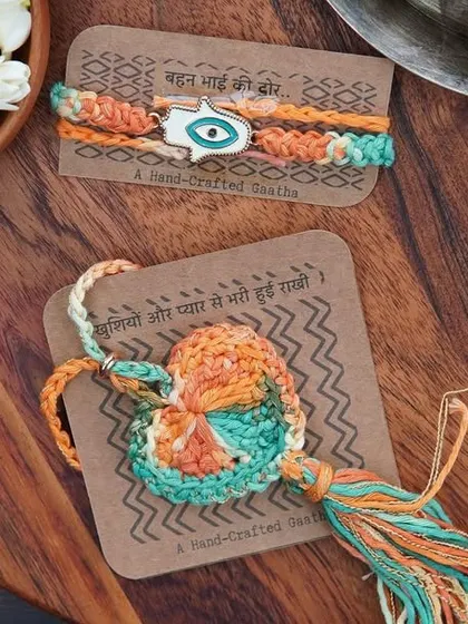 The orange and green Lumba and Rakhi set, beautifully packaged and ready for gifting.