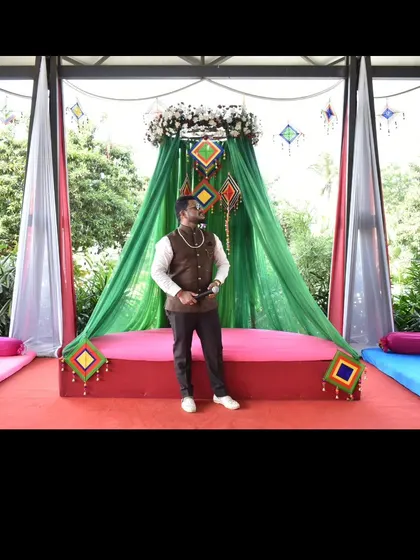 A shot of me at the venue before the Haldi ceremony begins, taking in the beautiful decor.