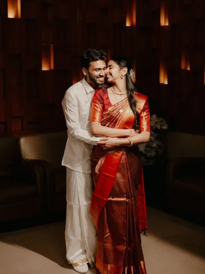 A happy and relaxed portrait of the couple, their smiles reflecting the joy of their union.