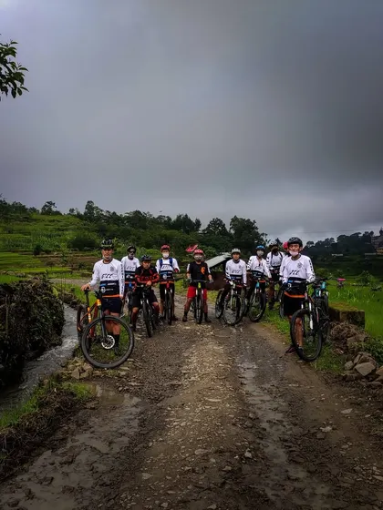 A group of young riders ready to take on a muddy trail. We are passionate about building the next generation of mountain bikers in India.