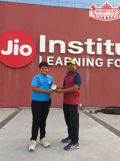 One of our players receiving an award at the Jio Institute, recognizing her performance in the AT Cup league game.