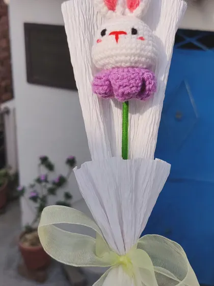 The full view of the wrapped bunny bouquet.