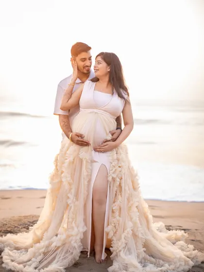 The love and excitement are palpable in this beautiful couple's portrait, set against the golden light of a Chennai sunrise.