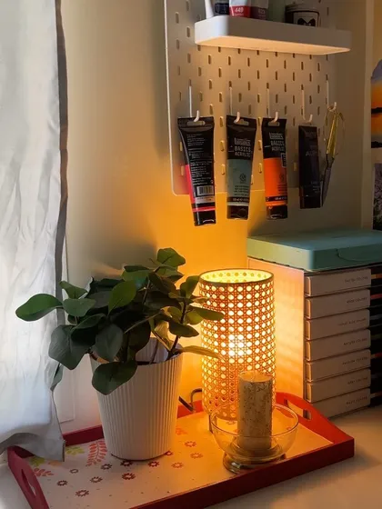 The warm glow of the lamp in my studio creates such a calming atmosphere for painting at night.