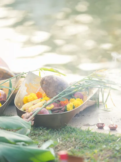 A close-up of the offerings for Chhath Puja, including fresh fruits and vegetables. The festival emphasizes gratitude for nature's bounty.