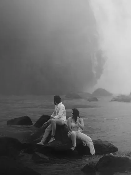 A quiet moment of reflection for Gokul and Vandana by the powerful falls. This black and white shot emphasizes the mood and atmosphere of their unique vow renewal location.