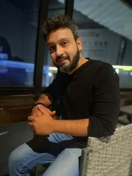 A simple portrait taken at night in a cafe.
