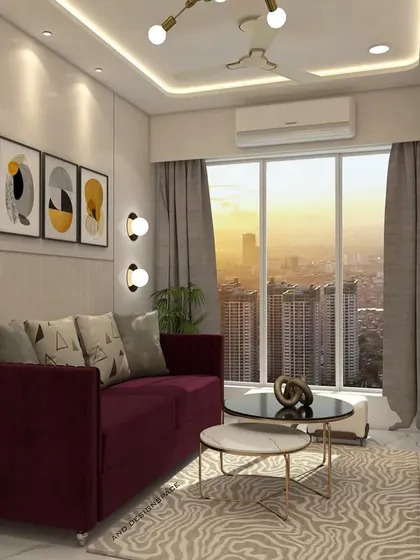Another perspective of the Bhayandar East living room, focusing on the seating area. The design includes a compact sofa, nested coffee tables, and modern art, making it an ideal setup for smaller apartments.