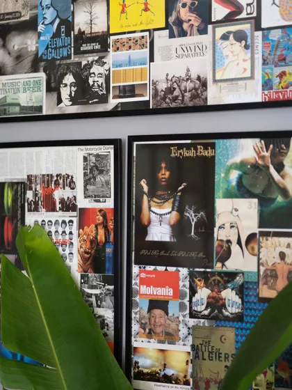 A detail shot of the curated art and posters that reflect our love for movies, music, and design.