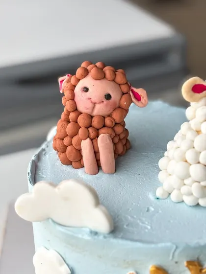 Look at this little guy! Every detail on my fondant figures is crafted with love.