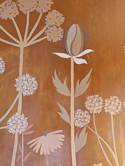 A close-up of the delicate, stylized flowers.