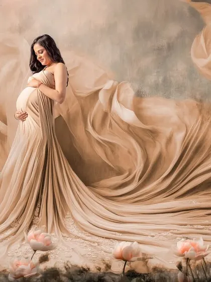This is what a dream setup looks like. For this fine art maternity portrait, I used flowing fabrics and a digitally enhanced floral landscape to create a truly magical, painting-like memory for this mommy-to-be.