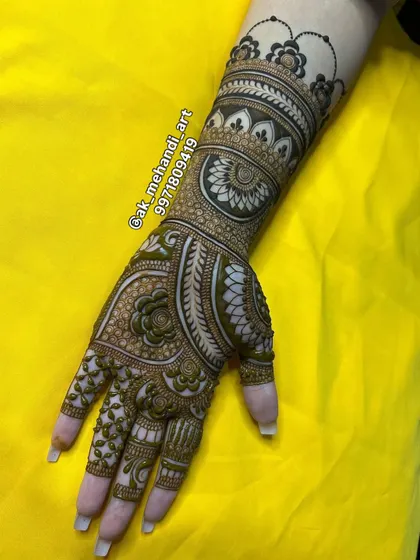 A full-hand design for Raksha Bandhan, combining various traditional elements for a rich and festive appearance.