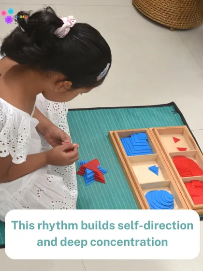 The rhythm of choosing work, completing it, and returning it to the shelf builds self-direction and deep concentration. This child is absorbed in her geometric puzzle.