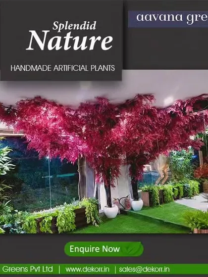 Splendid nature, handmade. This installation features large, handmade artificial trees with deep red leaves, creating a dramatic and immersive green space, even indoors.