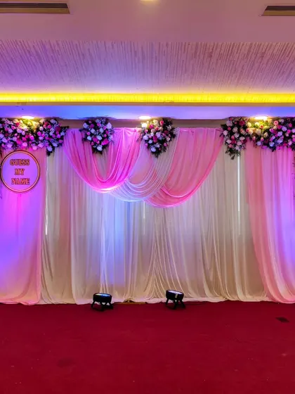 Another view of the pink draped stage.
