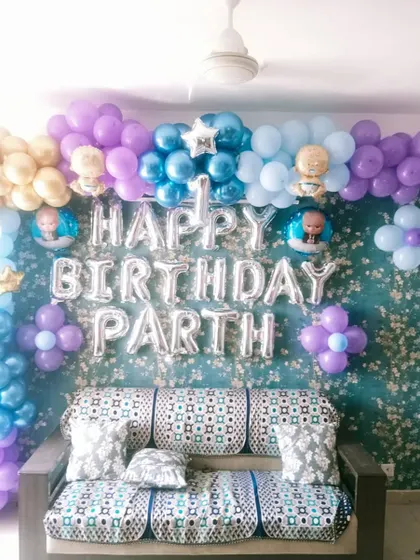 A sweet and simple Boss Baby themed decoration for Parth's first birthday at his home in Noida. Even in a smaller space, I can create a beautiful backdrop for your celebration.