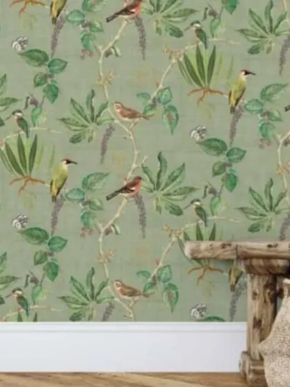 A soft green version of the bird and vine wallpaper. This colorway is fresh and calming, ideal for bedrooms or living spaces.