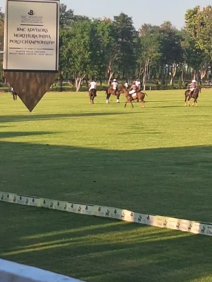 A view of the field during the Northern Indian Polo Championship. Hosting here involves setting the context for the game and celebrating the skill and tradition of polo.