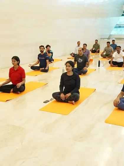 A wellness session in progress at ONGC, BKC Mumbai. The focus is on creating a peaceful and supportive environment where employees can disconnect from work pressures and reconnect with themselves.