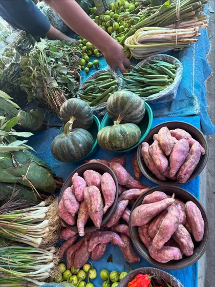 More treasures from a Nagaland market, including local pumpkins, sweet potatoes, and other wild vegetables. The vibrant colors show the freshness and quality of the produce we use.