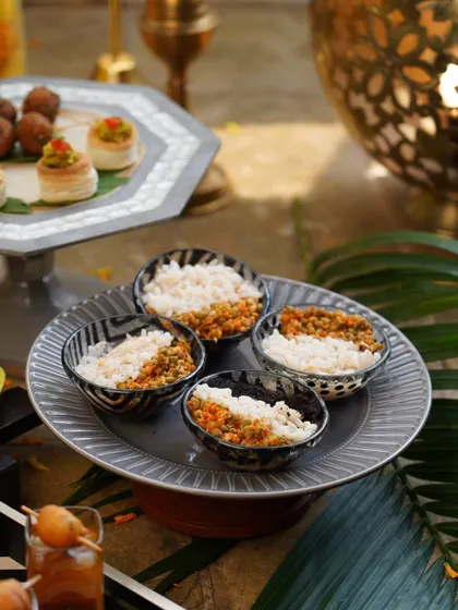 For Diwali, I offer something unique: Payaru Paal Kanji. This soulful rice and lentil broth, served as a small plate with fiery Chammanthi Podi and tangy pickle, is a humble yet elegant dish that adds a touch of Kerala to the festival of lights.