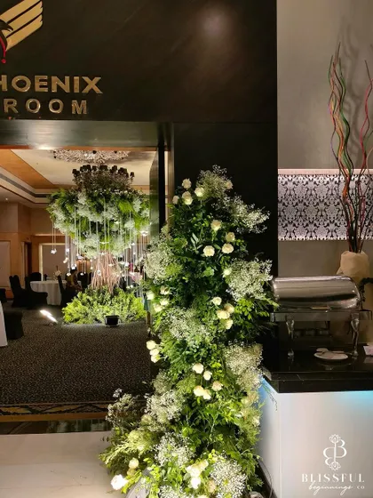 The entrance to the Phoenix Ballroom, where we installed our magnificent "Wish Tree." We love transforming indoor spaces into magical forests, creating an element of surprise and wonder for guests.