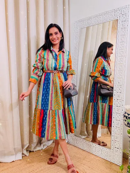 This multi-color striped shirt dress is so vibrant and fun. It's a pure cotton dress from Myntra for under 630, perfect for a vacation.