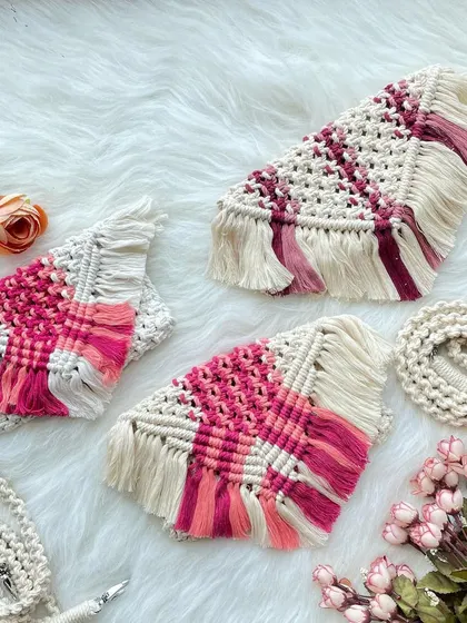 A flat-lay showing a set of three matching geometric fringe bags. This highlights how I can create custom sets for friends or bridesmaids in your chosen colors.