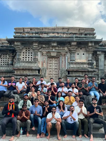 Our group at the historic Belur Temple, a beautiful architectural marvel we visit during our Bandaje trek weekend.