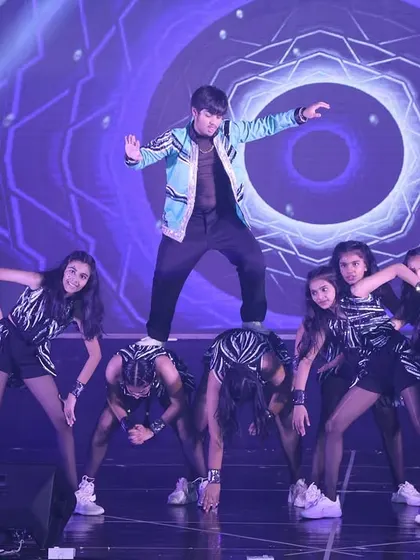 Our Bollyhop performance, where we fuse the energy of Bollywood with the sharp moves of hip hop. This act highlights the dynamic choreography our teen students master for the stage.