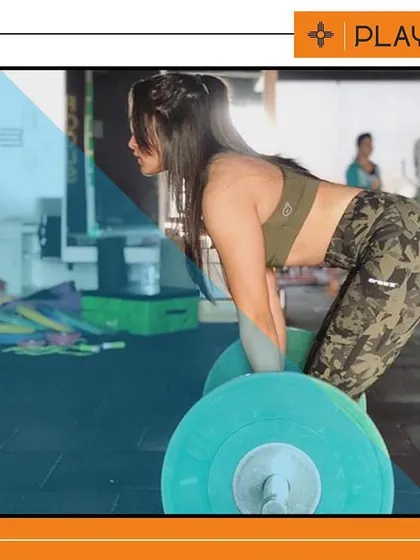 Strong girls rule. Here is one of our members performing a deadlift with perfect form. We focus on teaching correct techniques for strength training exercises to build real power and prevent injuries.