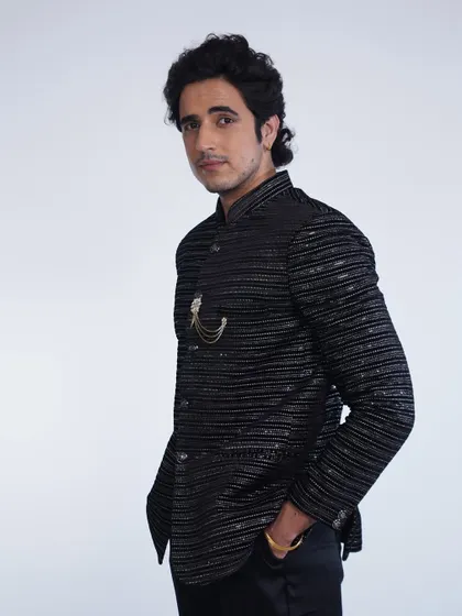 Another look at the black sequined bandhgala. The fit is impeccable and the style is undeniable.