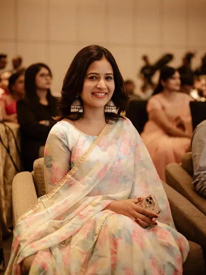Another beautiful candid of a guest. Her smile and the soft lighting create a warm and inviting photograph.