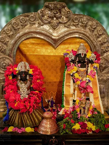 The idols of Lord Vishnu and Goddess Lakshmi, beautifully decorated for a festival. We celebrate all aspects of the divine, honoring both the masculine and feminine principles.