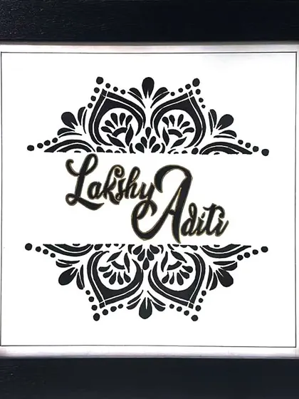 For this custom nameplate, I used a bold, black ink mandala design to create a striking frame for the names "Lakshy Aditi." It’s a modern yet intricate piece that shows how we can blend traditional patterns with personalized art.
