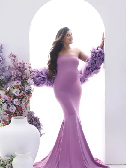A duplicate of image 12, this portrait captures a sense of hope and anticipation, with the purple gown adding a pop of regal color.