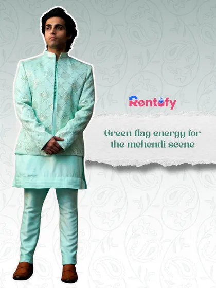 Green flag energy for the mehndi scene. This graphic features a beautiful light green Indo-western set.
