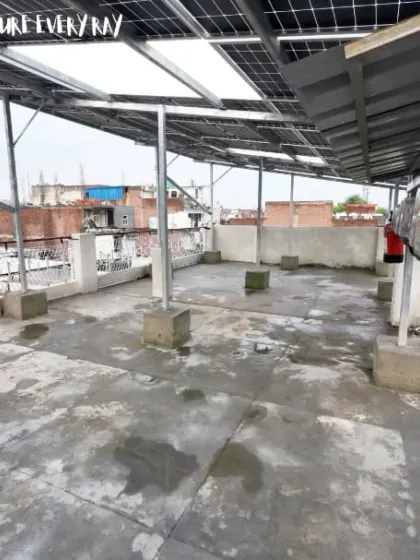 This perspective highlights the comprehensive coverage of the rooftop, capturing every ray of sun. This 13.5 kW system is a powerhouse, designed for maximum energy generation and savings.
