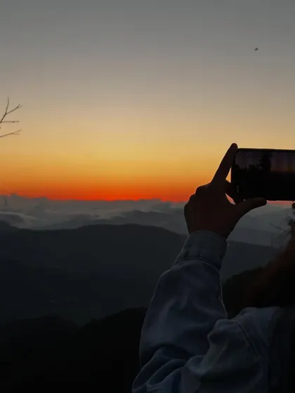 Capturing the sunset over the mountains. These moments of awe are a powerful form of meditation and a key part of the retreat experience.