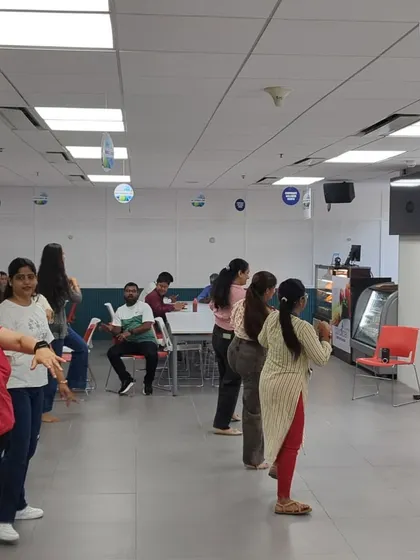 The team at Mercer following along during our Zumba session. I make sure everyone feels involved, creating a sense of unity and shared accomplishment.