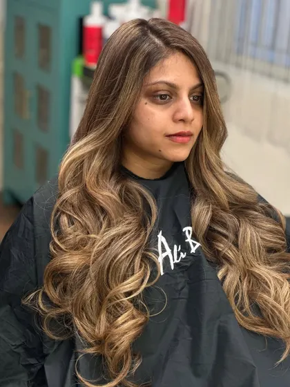 The final look is a testament to what's possible with expert blonding services.