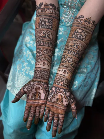 Custom bridal mehendi featuring portraits of the bride and groom. I love incorporating personal stories and figures to make each design unique and meaningful.