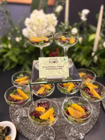 A refreshing and healthy appetizer of Roasted Beetroot, Orange, and Walnut Quinoa Salad. Served in elegant coupe glasses, this dish is a light, gluten-free, and vegan option that doesn't compromise on flavor or style.
