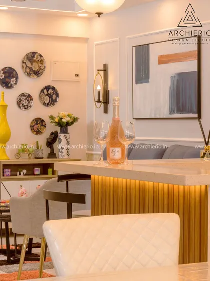 A close-up of the bar area, showing the beautiful details like the stone countertop and decorative plate wall. It's a perfect blend of functionality and aesthetics.