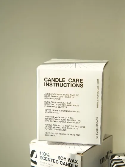 A close-up of the candle care instructions, a small detail that reflects my commitment to conscious packaging.