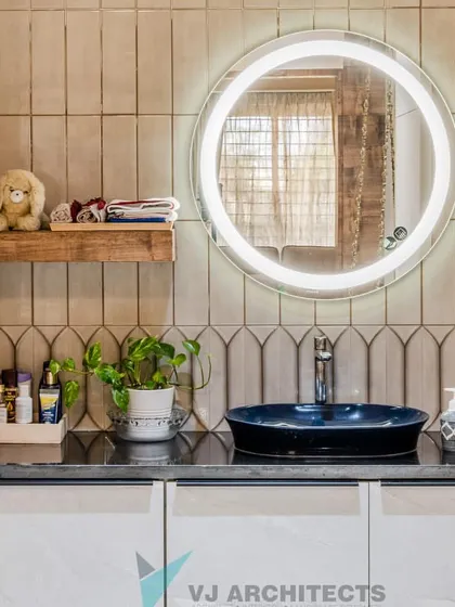 A duplicate view of the bathroom vanity, emphasizing the clean lines and mix of materials. The round, illuminated mirror is a popular choice for modern bathroom design.