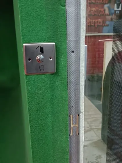 This is a push-to-exit button installed for a door access control system. It allows for easy and quick egress from a secured area without needing a key or card.